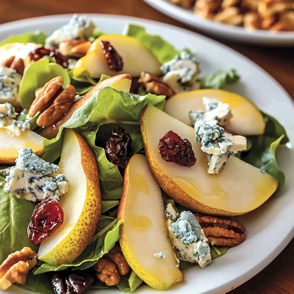 A plate of food with a salad and a blue cheese dressing.
