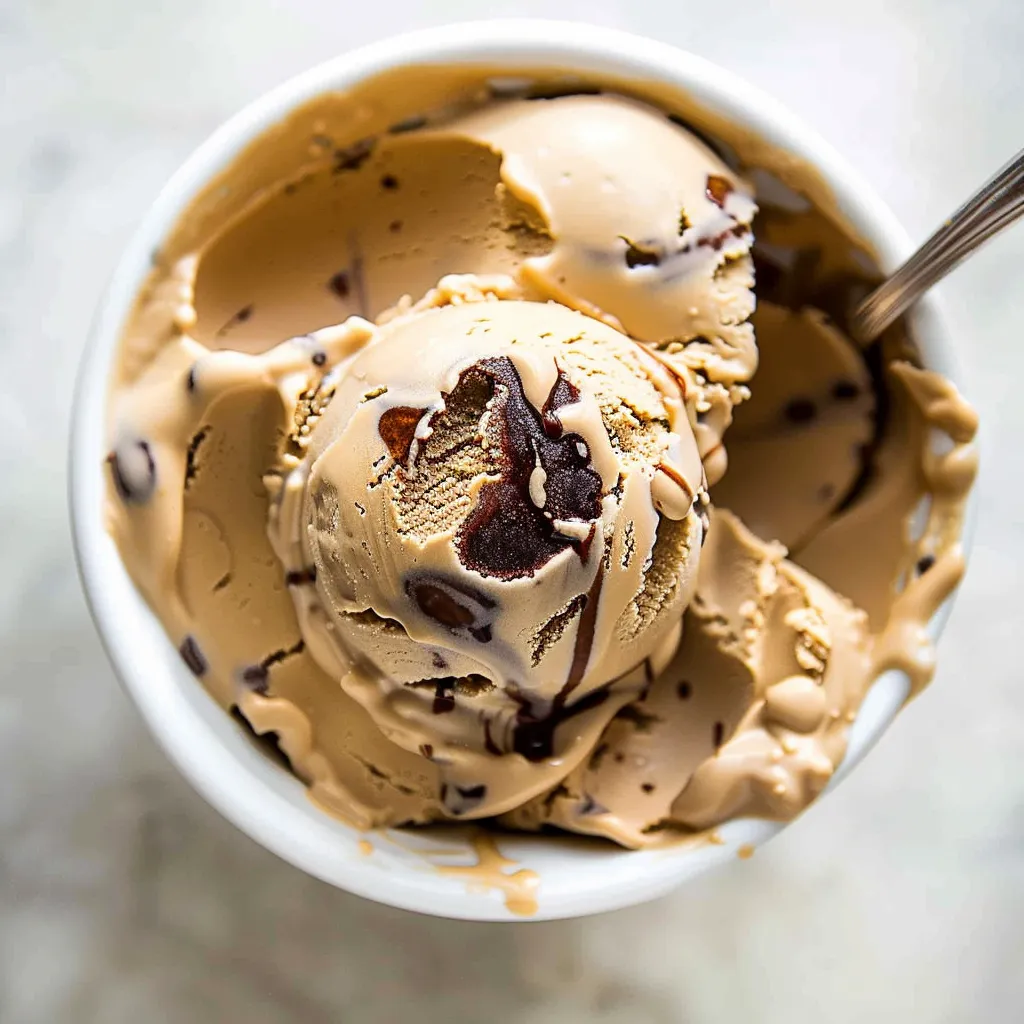 A scoop of ice cream in a bowl.